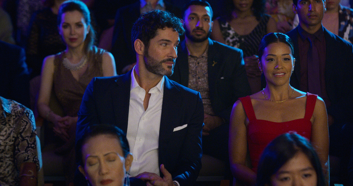 Tom Ellis and Gina Rodriguez in a theater scene in 'Players'