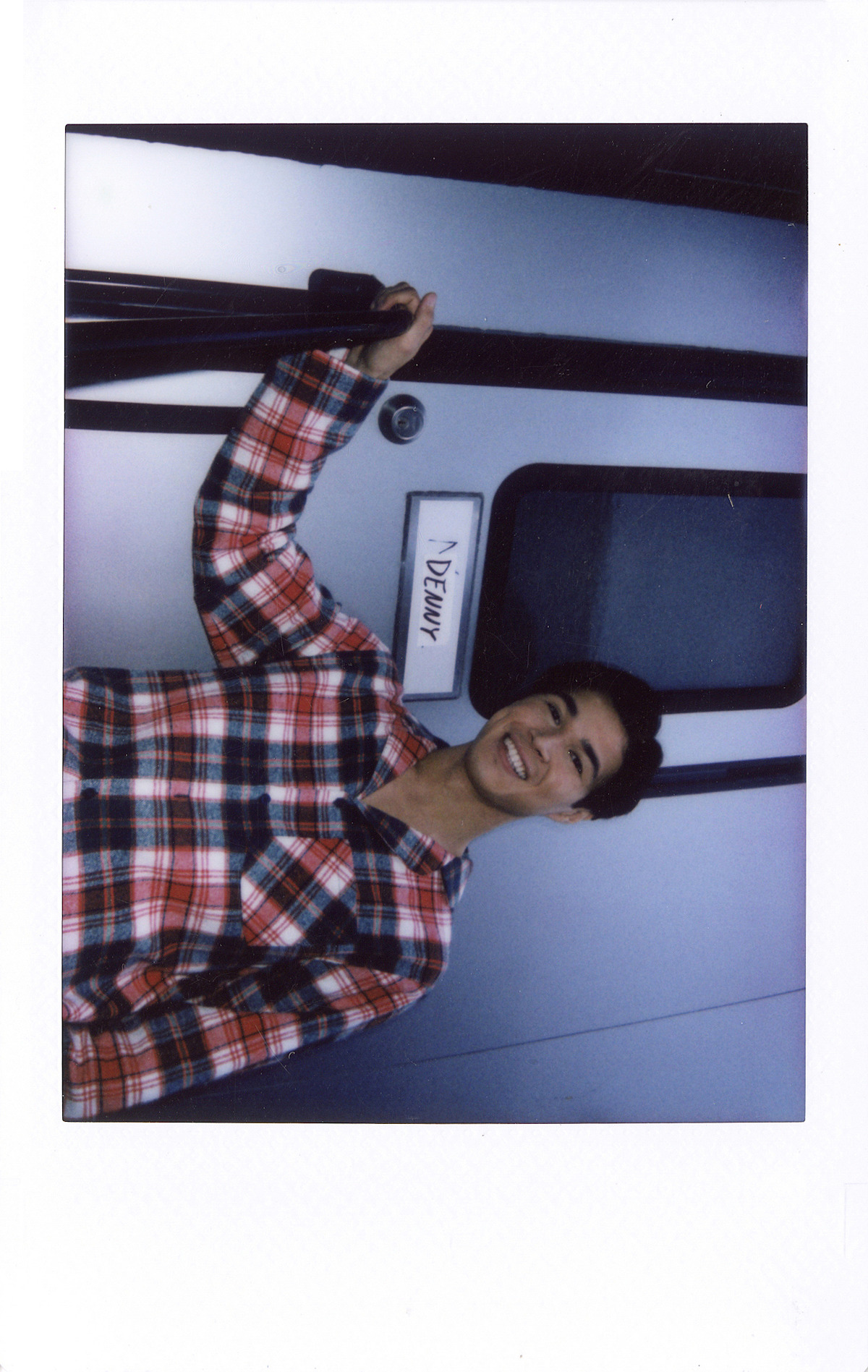 Kai Bradbury as Denny Cutler stands outside of his trailer in Season 5 of ‘Virgin River.’