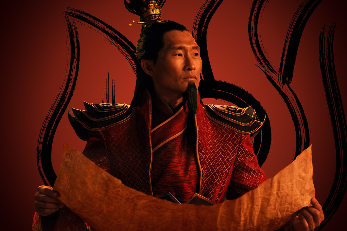 Daniel Dae Kim as Fire Lord Ozai reads a scroll in Season 1 of ‘Avatar: The Last Airbender’
