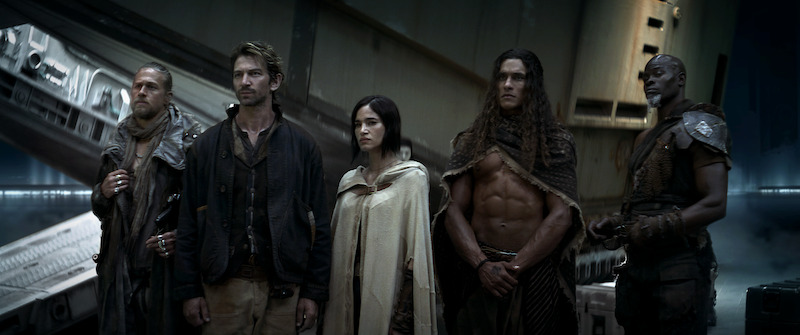 (L-R) Charlie Hunnam as Kai, Michiel Huisman as Gunnar, Sofia Boutella as Kora, Staz Nair as Tarak and Djimon Hounsou as Titus in Rebel Moon.