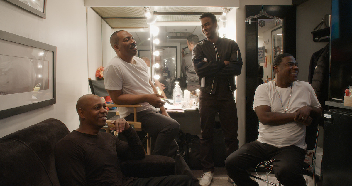 Being Eddie. (L to R) Dave Chappelle, Eddie Murphy, Chris Rock and Tracy Morgan in Being Eddie. Cr. Courtesy of Netflix ©2025