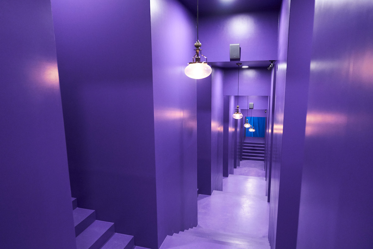 A purple hallway set in Season 2 of ‘Squid Game’