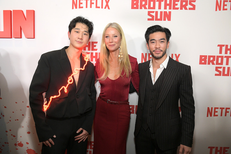 Justin Chien, Gwyneth Paltrow, and Sam Song Li pose together on the red carpet of Netflix's 'The Brothers Sun' Los Angeles Premiere