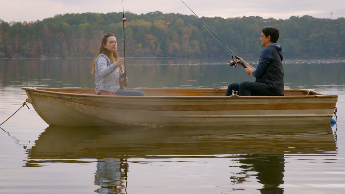 An image of Sam and Daniel in a fishing boat