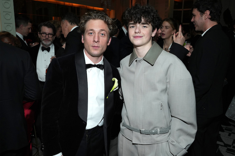 Jeremy Allen White and Owen Cooper stand next to each other in front of the camera.