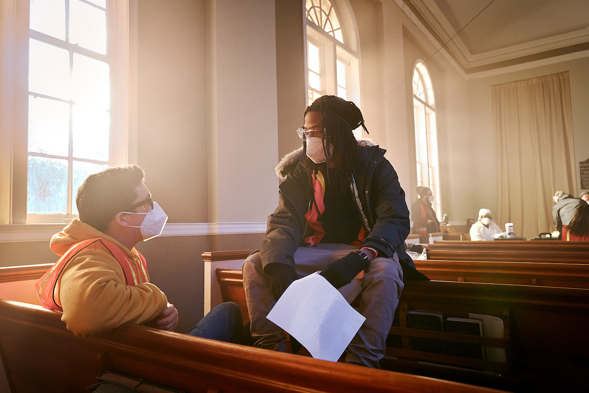 Writer-producer Tony Rettenmaier and writer-director-producer Juel Taylor on the set of ‘They Cloned Tyrone.’