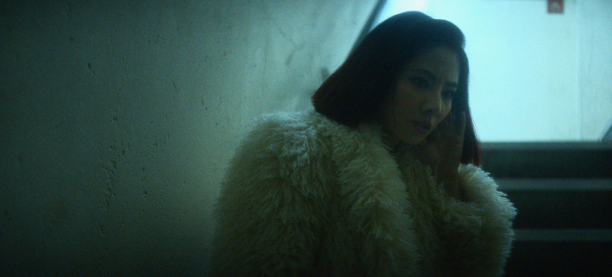 Jing Lusi as Theresa Yang.