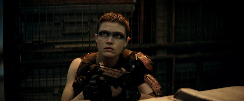 E. Duffy as Milius in Rebel Moon. 