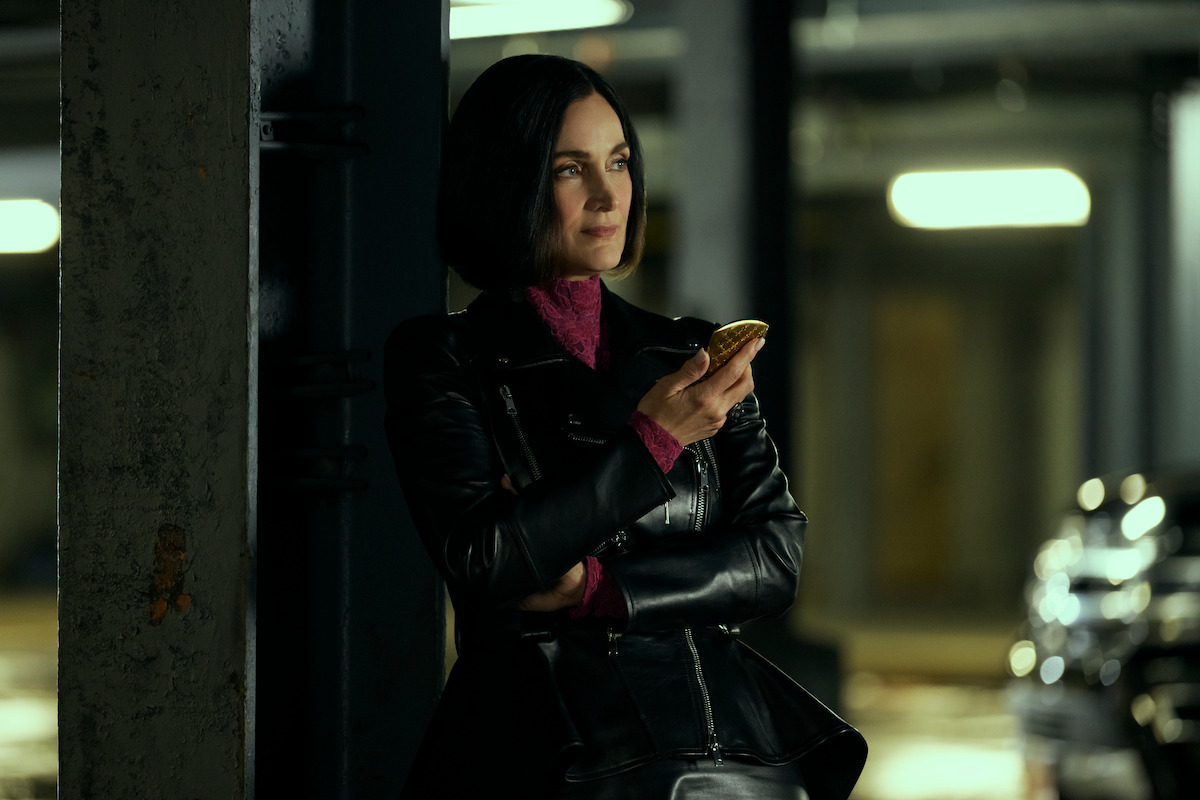 Carrie-Anne Moss as Greta Nelso in ‘FUBAR’ Season 2.