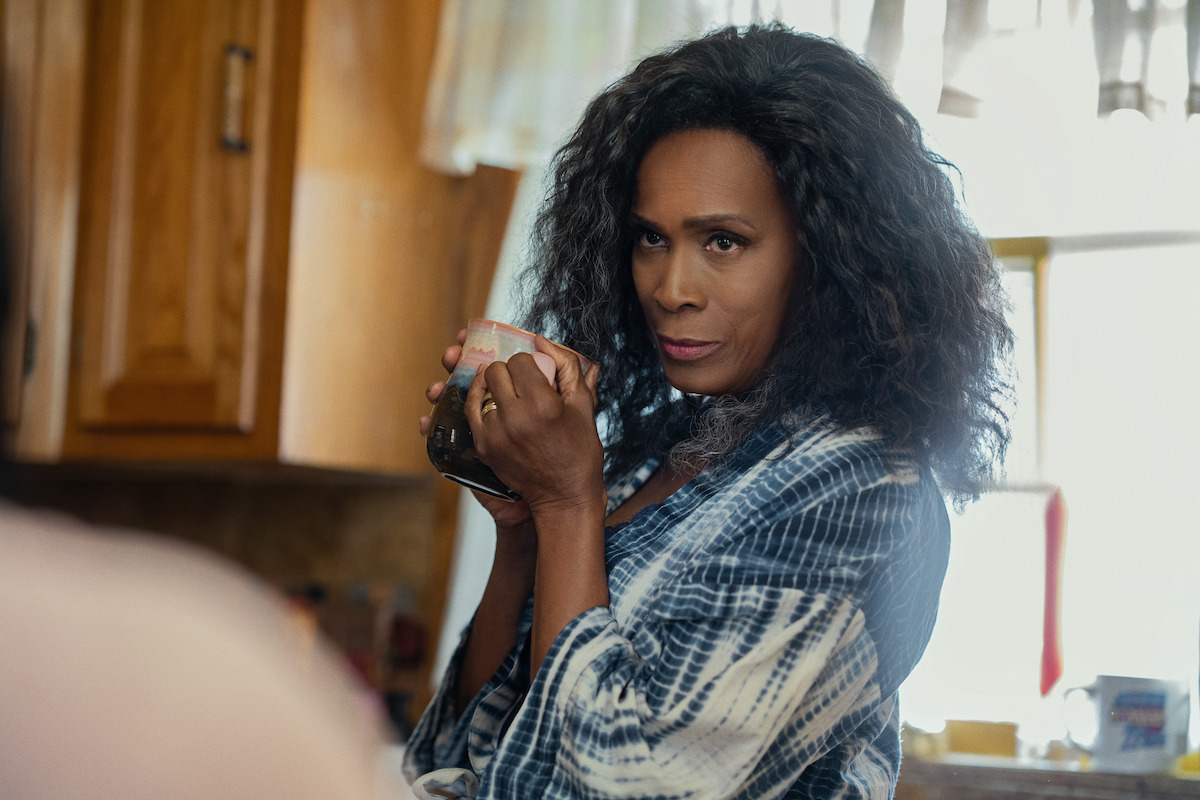 Janet Hubert holds up a coffee mug in a still from ‘The Perfect Find.’