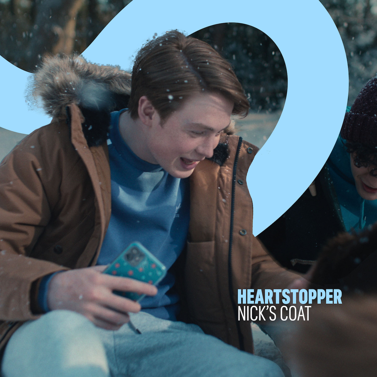 Kit Connor as Nick wears a brown coat in ‘Heartstopper’