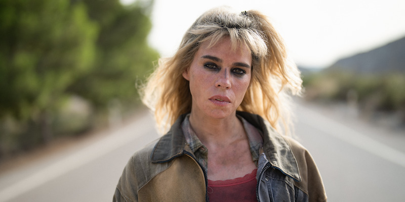 Billie Piper as Cassandra stands in the middel of the street in Season 1 of ‘Kaos’