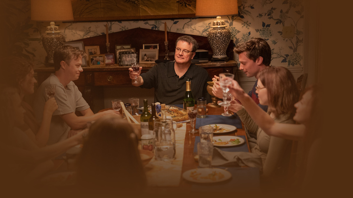 Dane DeHaan, Colin Firth, Patrick Schwarzenegger, and more pose around a table as the Peterson family in the drama series The Staircase.