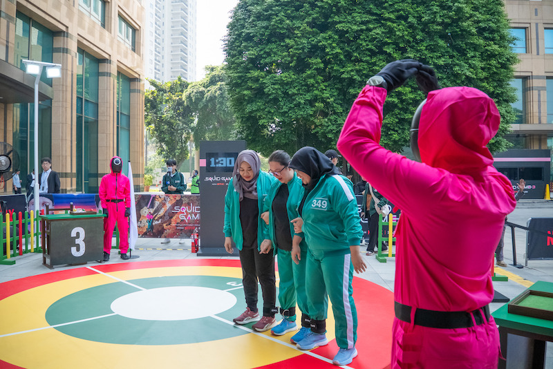 Fans compete during a 'Squid Game' Season 3 event in Jakarta, Indonesia.