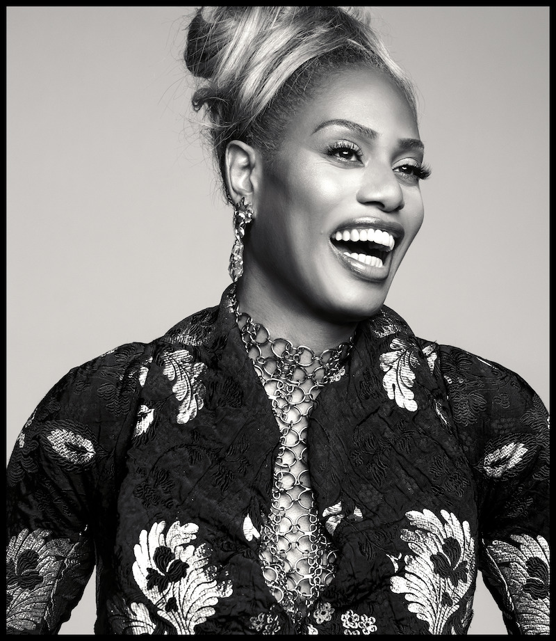 Laverne Cox smiles as she poses for a photo.