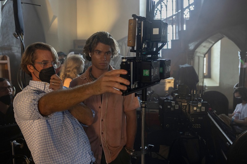 Director Jonas Pate and Chase Stokes in Outer Banks Season 3 Behind-the-Scenes Photo Gallery