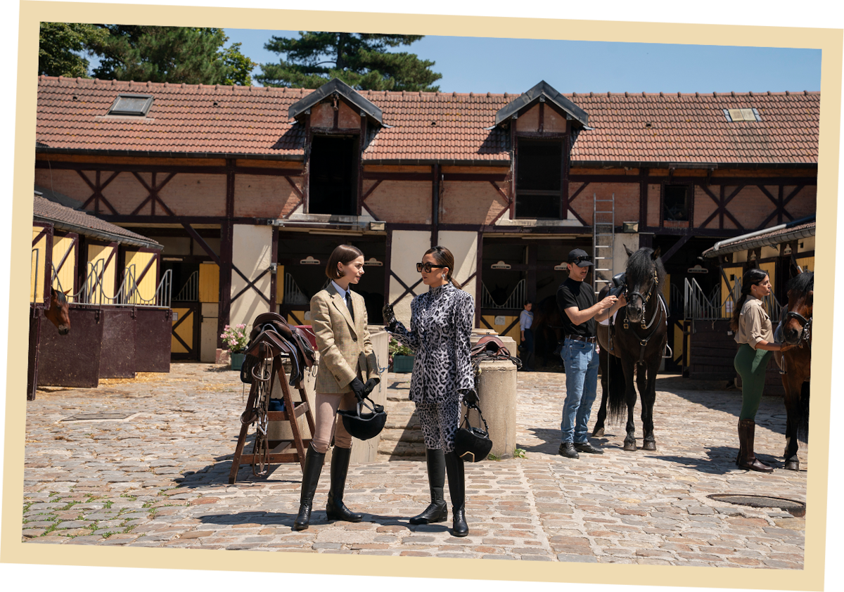 Lily Collins as Emily and Ashley Park as Mindy in ‘Emily in Paris’ Season 5.