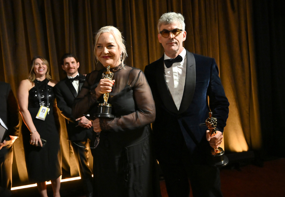 Tamara Deverell (L) and Shane Vieau pose backstage with the Production Design Award for “Frankenstein” during the 98th Oscars at Dolby Theatre on March 15, 2026 in Hollywood, California.