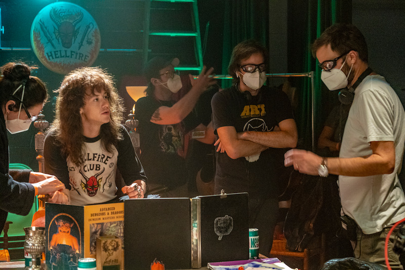 Eddie Munson (Joe Quinn) is busy gearing up for the end of his D&D campaign - 68 Behind-the-Scenes pics from ‘Stranger Things’ Season 4 You Have to See