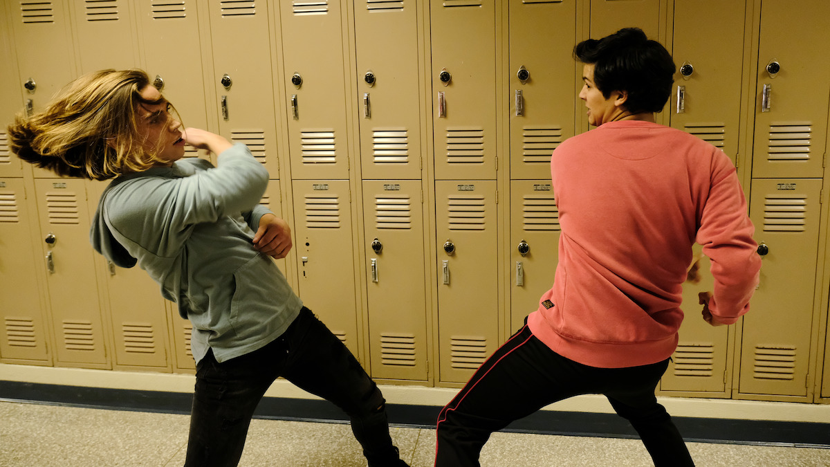 Robby Keene fights in school hallway