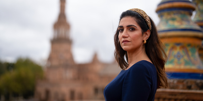 Leila Farzad as Ari looks over her shoulder in 'KAOS'