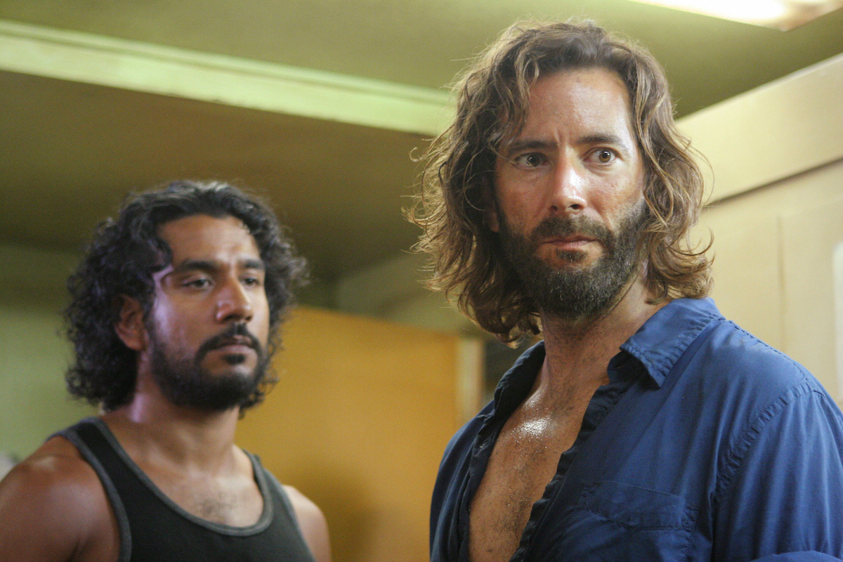 Naveen Andrews stands behind Henry Ian Cusick.