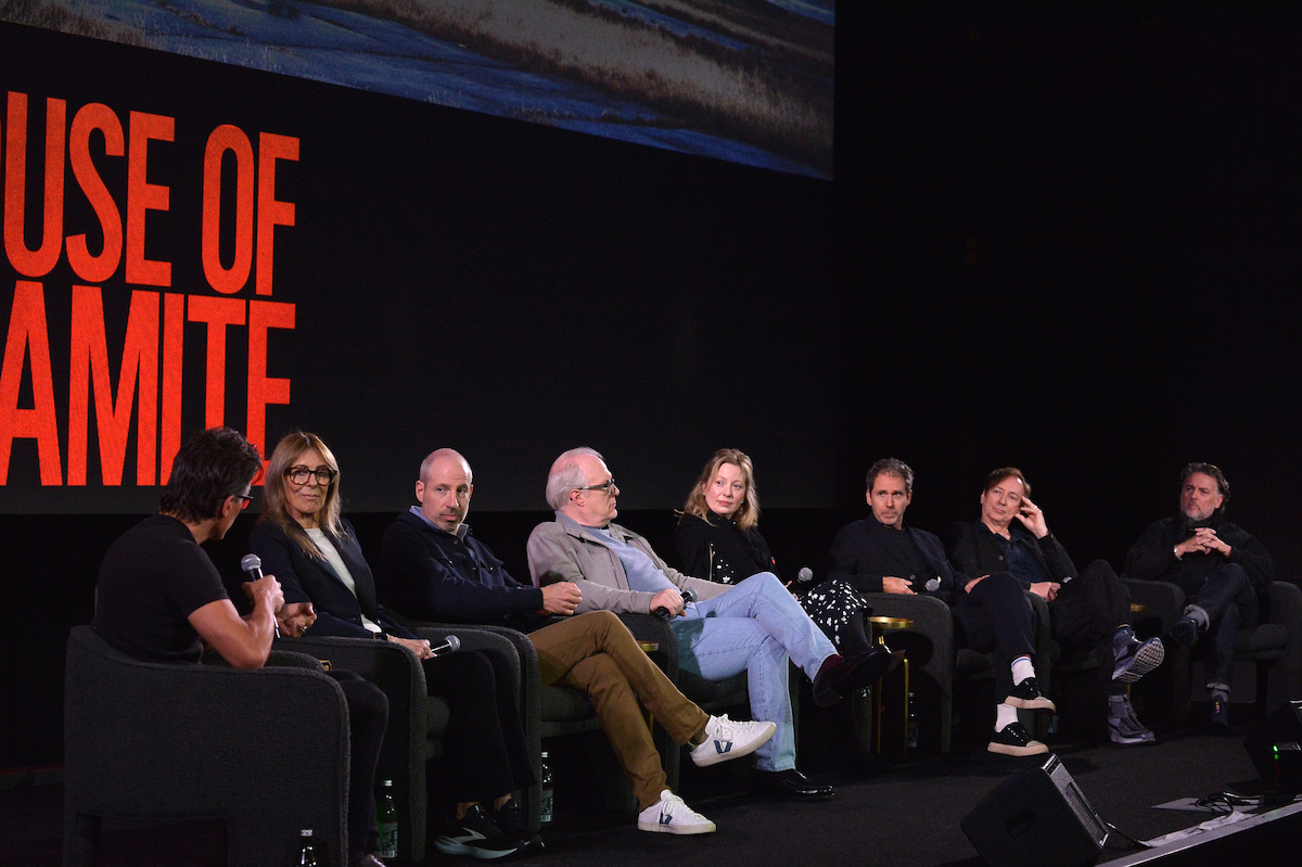 Kathryn Bigelow, Noah Oppenheim, Tracy Letts, Susanne Scheel, Kirk Baxter, Volker Bertelmann, and Jeremy Hindle sit on stage with microphones in hand.