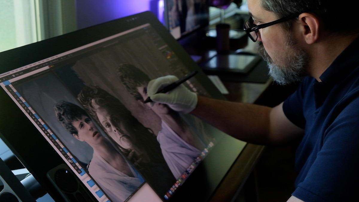 Rory Kurtz digitally paiting a mural for ‘The Sandman’