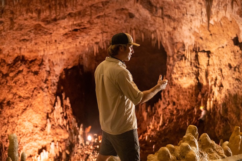 Director Jonas Pate in Outer Banks Season 3 Behind-the-Scenes Photo Gallery