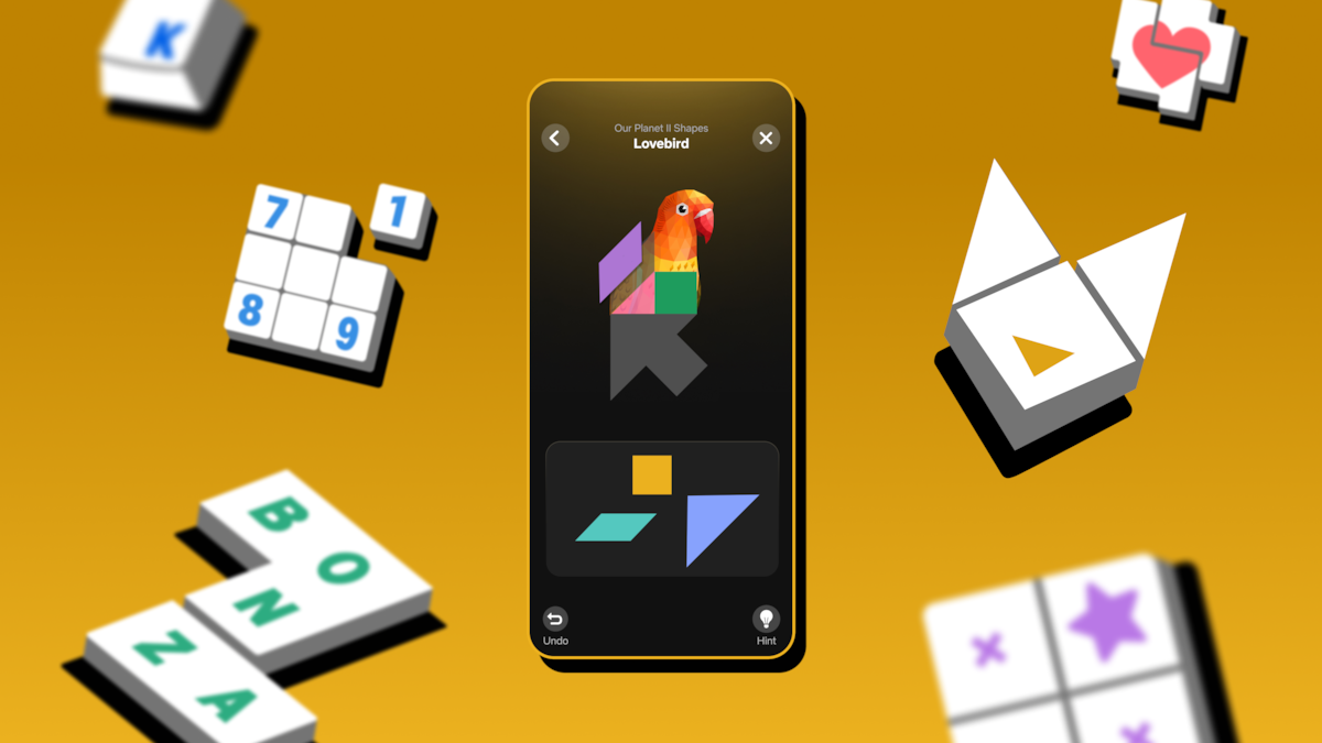 A mobile game screen with a tangram lovebird in the center, surrounded by floating puzzle tiles, numbers, letters, and icons on a warm orange background, creating a playful and engaging mood.