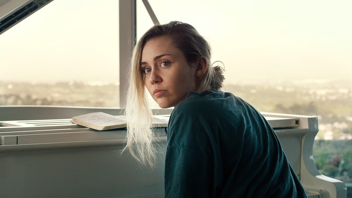 Dancers on stage while filming a music video. 