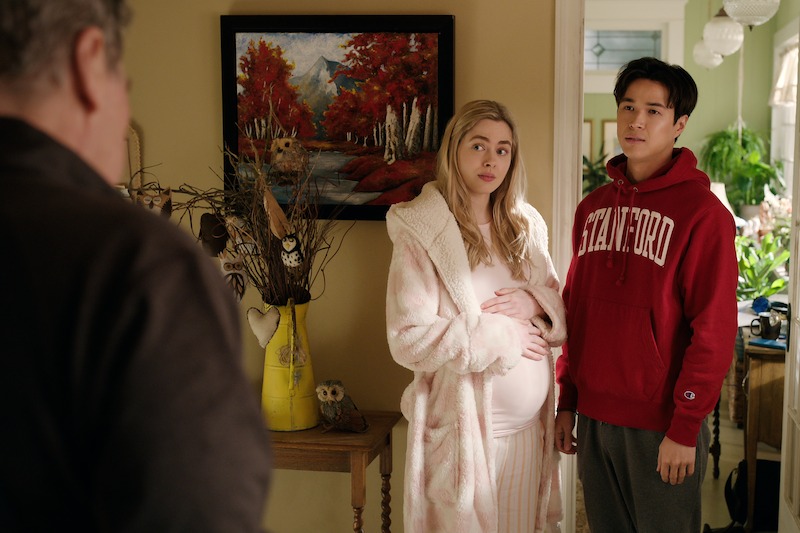 Sarah Dugdale as Lizzie holds her baby bump with Kai Bradbury as Denny Cutleri n Season 6 of 'Virgin River'