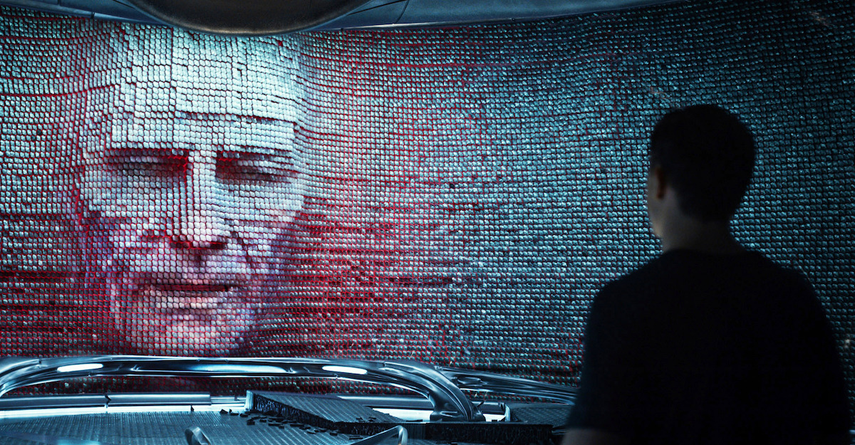 The digitally rendered face of Zordon (Bryan Cranston)