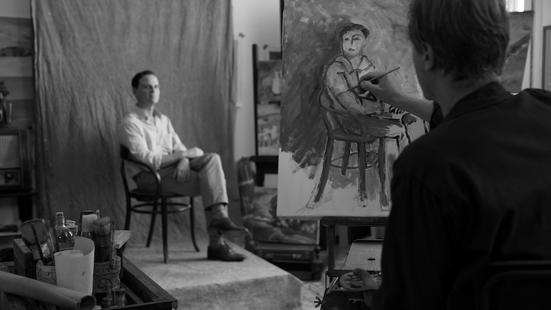 Andrew Scott as Tom Ripley sits to have his portrait painted in 'Ripley'
