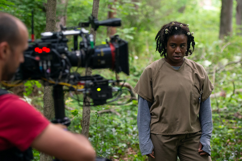 (L to R) Ludovic Littee (Director of Photography), Uzo Aduba as Suzanne "Crazy Eyes" on the set of Orange Is The New Black Season 4.