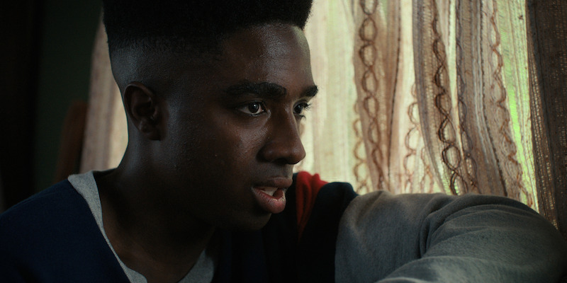 McLaughlin as Lucas in Stranger Things Season 4, Volume 2 - See Over 100 Photos From ‘Stranger Things’ Season 4 Volume 2