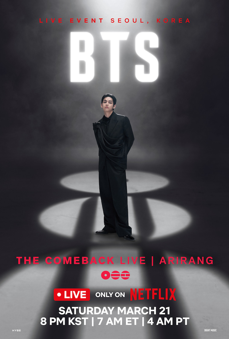 V in a black outfit stands under a spotlight in a dark, smoky environment with a large glowing "BTS" sign and red text reading "Live Event Seoul, Korea" above.