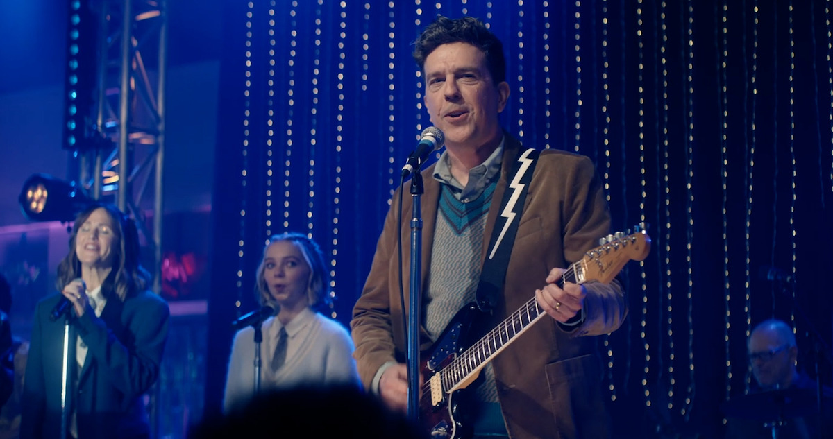 Ed Helms performs 'Santa Claus is Coming to Town' in 'The Family Switch.' 