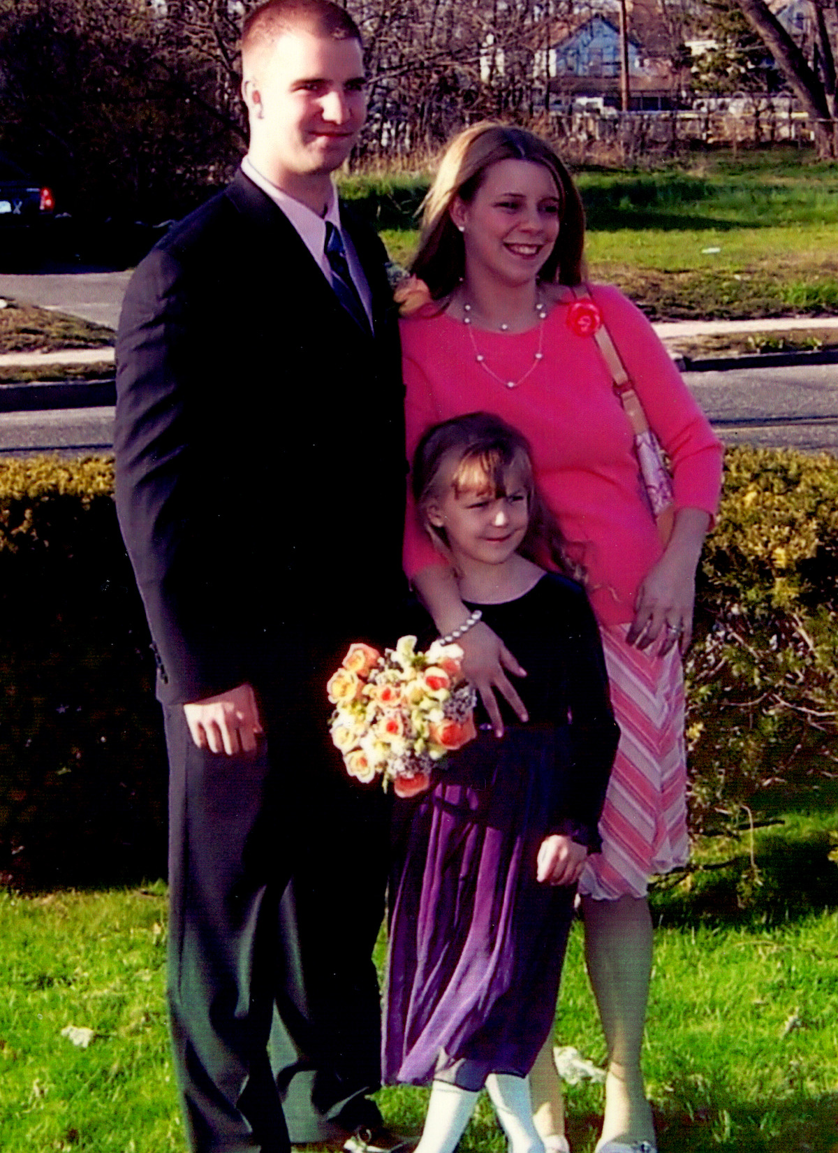 Jim Schmidt and Nichole Schmidt with young Gabby