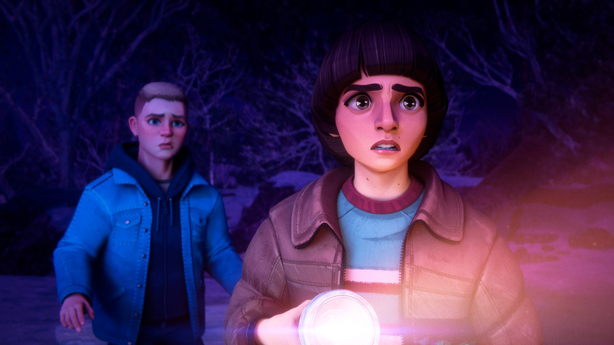 Two animated kids stand outside at night in a dark, wooded area; one holds a flashlight and looks worried, while the other stands behind, also appearing concerned.