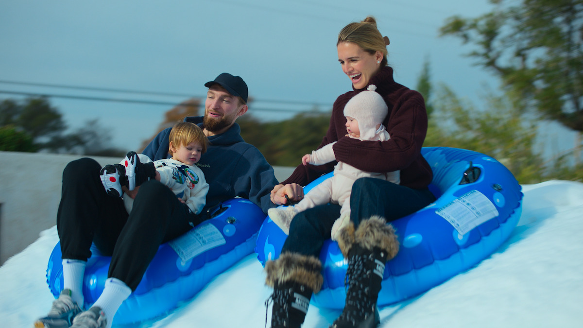 Domantas Sabonis enjoying the snow with his wife and children.