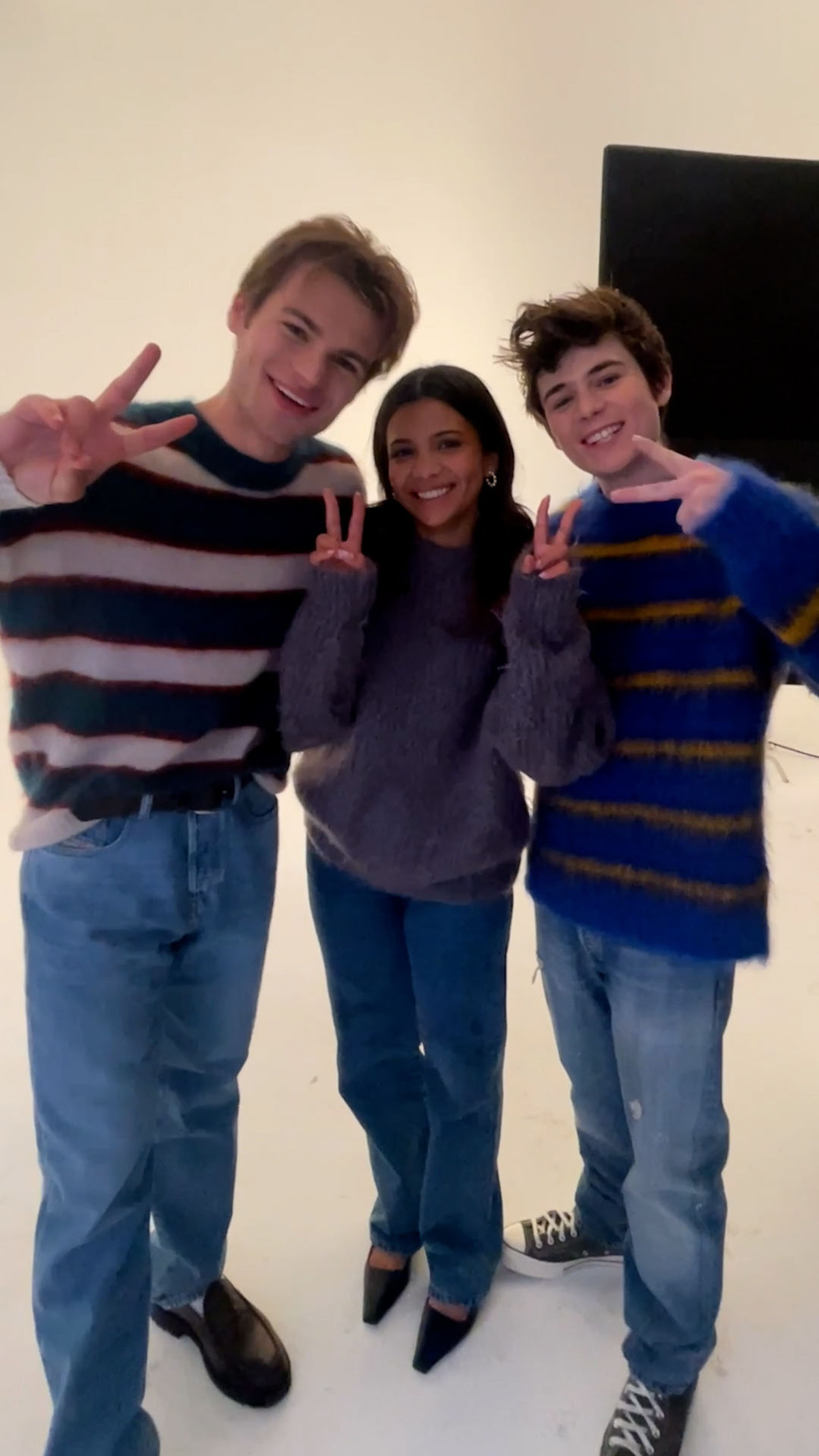 Noah LaLonde, Nikki Rodriguez, and Ashby Gentry each hold up two fingers in celebration of Season 2 of 'My Life with the Walter Boys'