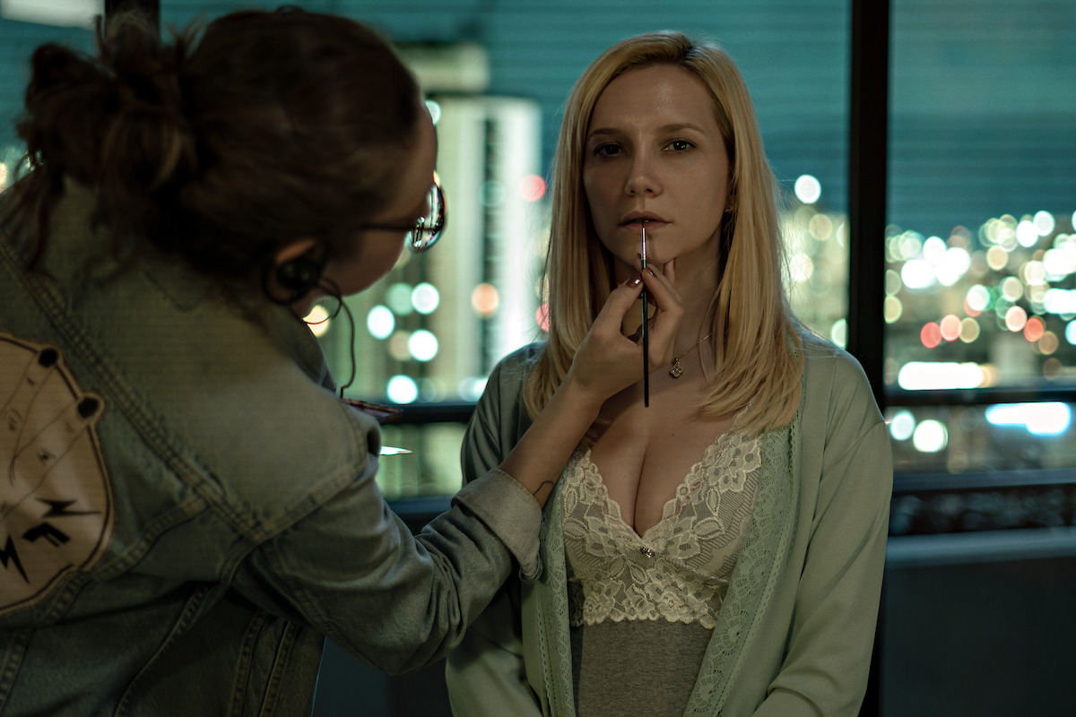 Actress Lorena Comparato gets her makeup done for a scene in “Shadows of a Woman”