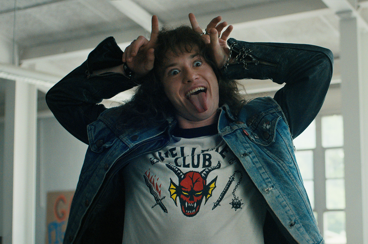  A man with long hair making a funny face.