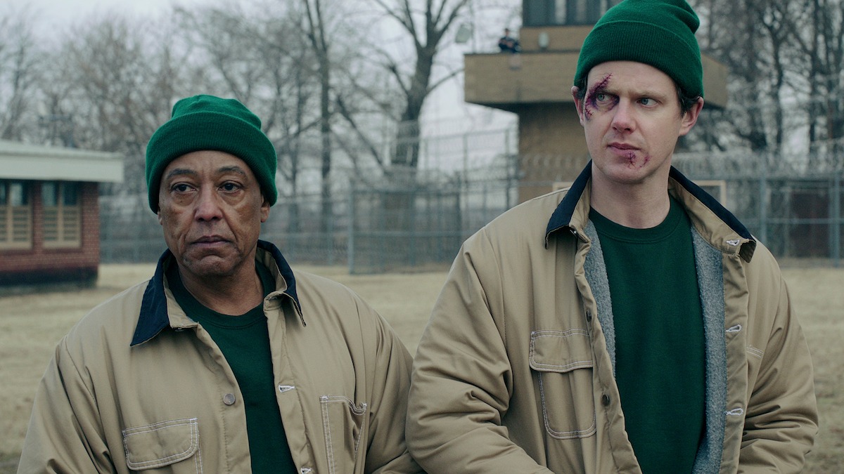 Ray (Giancarlo Esposito) wearing prison clothing and a green beanie.