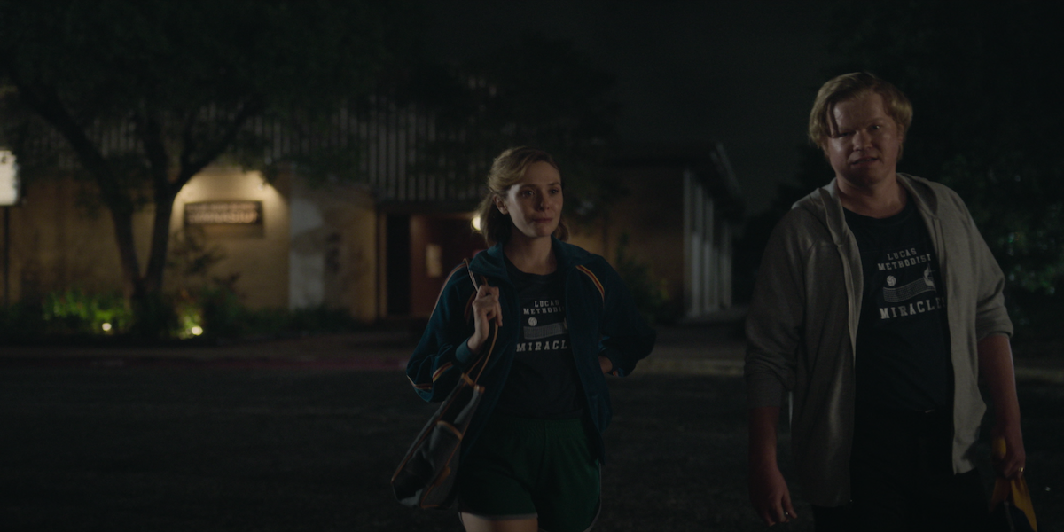 Elisabeth Olsen as Candy and Jesse Plemmons as Allan leave volleyball practice in ‘Love & Death.’