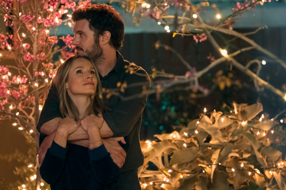 Adam Brody as Noah and Kristen Bell as Joanne embrace each other in Season 1 of ‘Nobody Wants This’