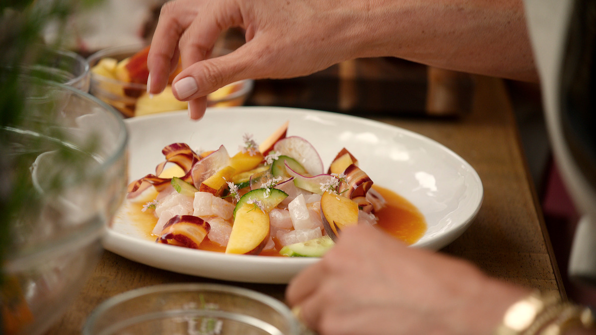 Halibut ceviche being plated.