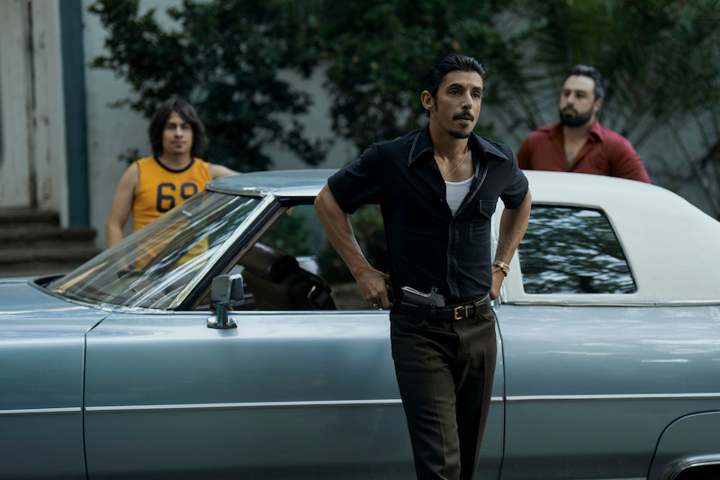 Mario Perez as Diego, Alberto Guerra as Dario in episode 104 of Griselda. 