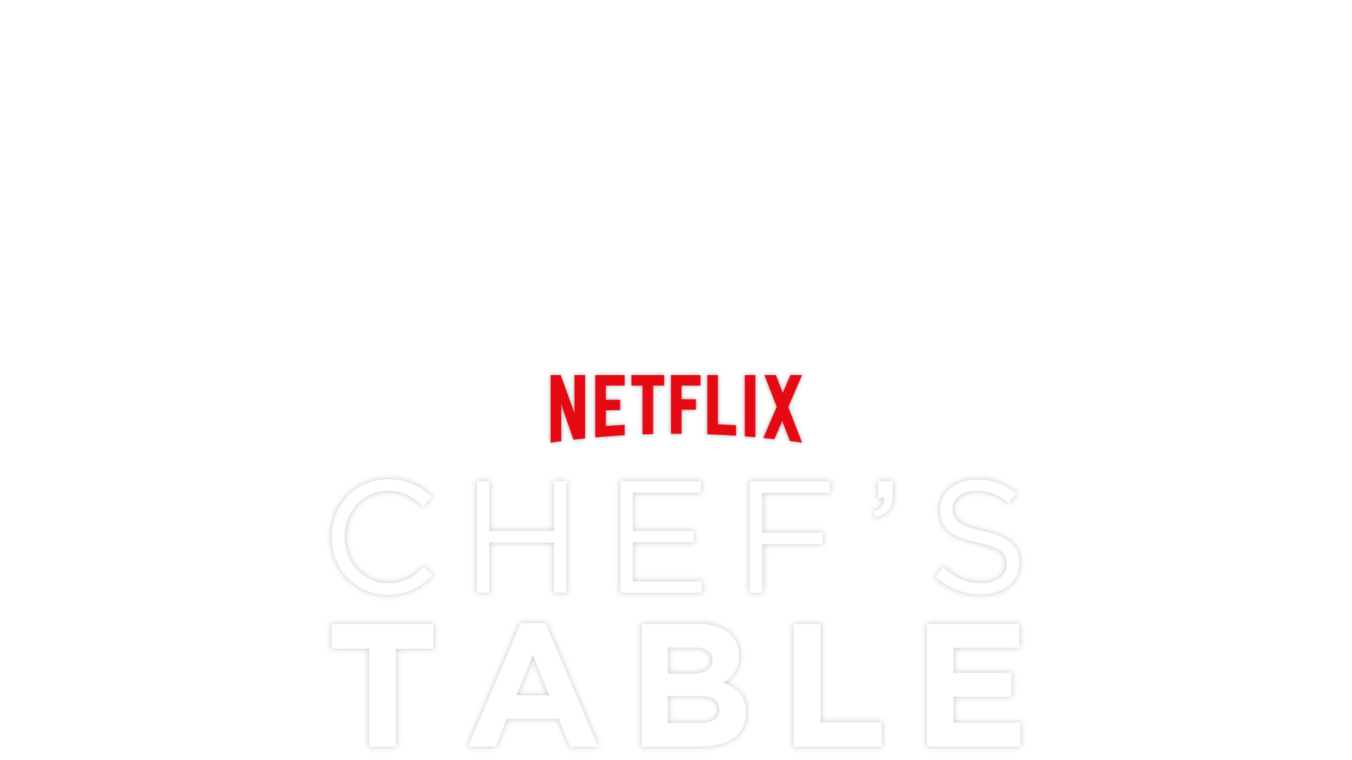 A plate of delicious looking lobster and dipping sauces on top of a glass table